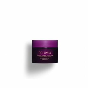 Dunkelviolette Anti-Aging-Creme im Glasbehälter mit goldfarbener Schrift.