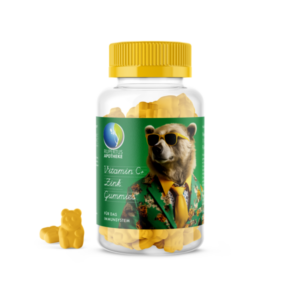 Glasbehälter mit gelben Vitamin C und Zink Gummibärchen, beschriftet für das Immunsystem, mit bärförmigen Gummibärchen daneben.