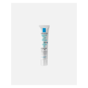 Ein schlanker, weißer Tubus mit blauen Akzenten, beschriftet mit "Effaclar Duo+M" von La Roche-Posay, für Hautpflege.
